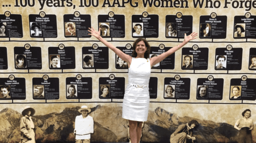 Denise Cox, then AAPG president-elect 2017, at the Rock Star exhibit, exuberantly celebrates 100 of her female predecessors in the geosciences.
