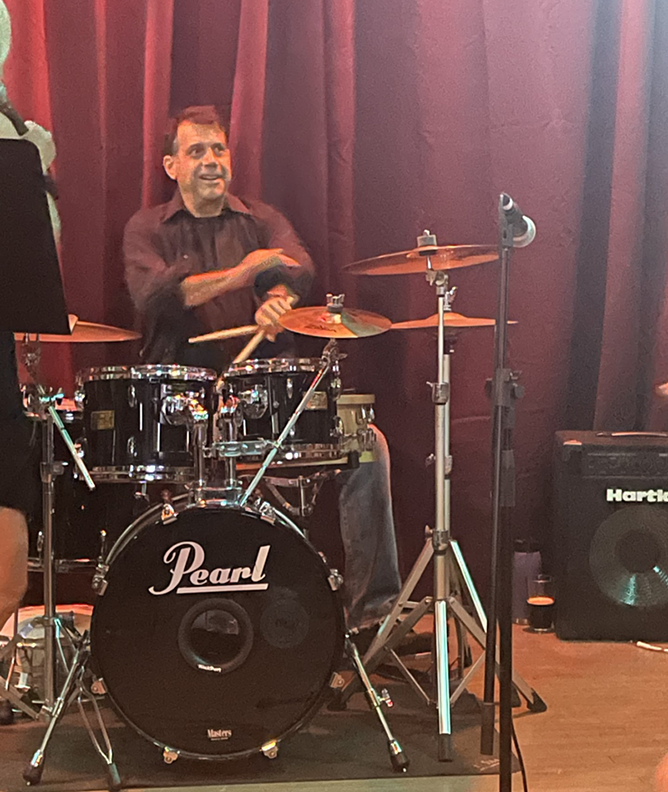 Kaimowitz on the drums with his band.
